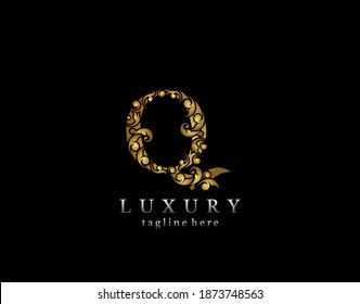 Elegant Q Letter Gold logo icon, luxury flourishes ornament monogram design vector.