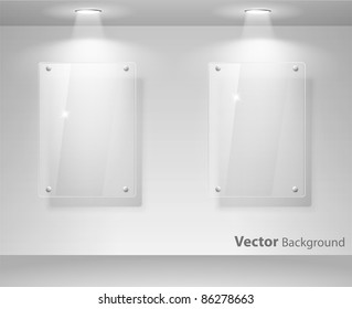 Elegant realistic glass frames on a wall with lights for images and advertisement. Fully editable eps10