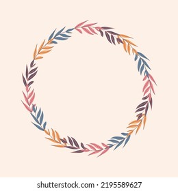 Elegant round frame, wreath or border made of colorful fallen simple leaves.