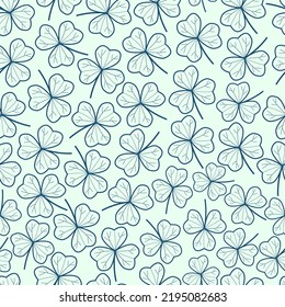 Elegant seamless floral ditsy pattern design of three leaf clover leaves. Trendy foliage illustration of shamrock leaf for St. Patrick’s Day. Repeat texture background for surface printing and textile