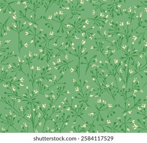 Elegant seamless floral pattern with delicate branches and small blossoms on a green background. Tiny flowers stems ornament print. Ideal for stationery, packaging, textiles,