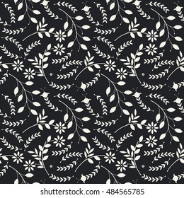 Elegant seamless pattern with beautiful tulip and chamomile flowers, leaves and plants can be used for design fabric, backgrounds, wrapping paper, package, covers, linen and more ideas.