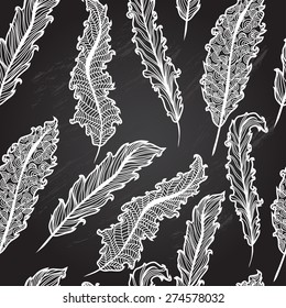 Elegant seamless pattern with decorative feathers, design element. Chalkboard background
