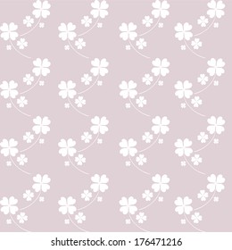 elegant seamless pattern with decorative four leaf clovers, design element