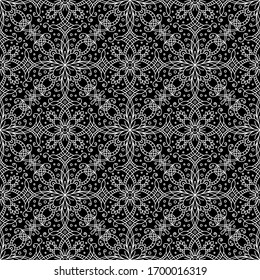 elegante y sin fisuras. lujoso encaje blanco con flores y hojas sobre fondo negro. diseño textil simétrico