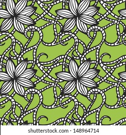 Elegant seamless pattern with  flowers on green background