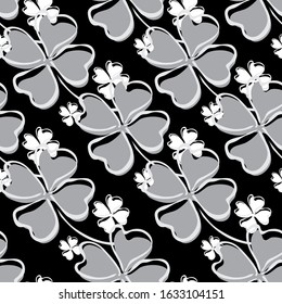 Elegant seamless pattern with four leaf clovers, design elements. Floral pattern for invitations, cards, print, gift wrap, manufacturing, textile, fabric, wallpapers. St Patrick