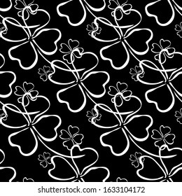 Elegant seamless pattern with four leaf clovers, design elements. Floral pattern for invitations, cards, print, gift wrap, manufacturing, textile, fabric, wallpapers. St Patrick