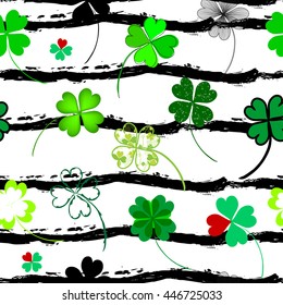 Elegant seamless pattern with hand drawn decorative fourleaf clovers, design elements. Can be used for invitations, greeting cards, scrapbooking, print, gift wrap, manufacturing. Stripe background