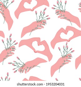 Elegant seamless pattern of hand holding blooming flowers and hand heart gesture. Spring holidays concept. Floral background.