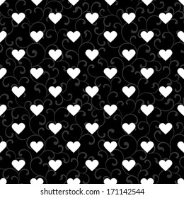 Elegant seamless pattern with hearts on a black background