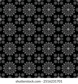 Elegant seamless pattern of intricate snowflakes on a dark background