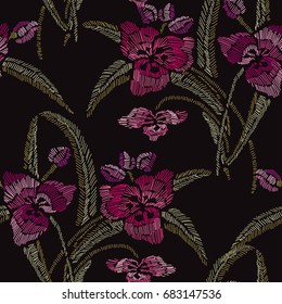 Elegant seamless pattern with lily flowers, embroidery style. Editable colors