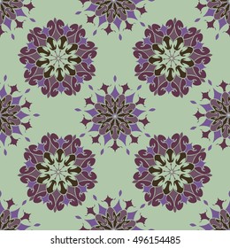 Elegant seamless pattern with Mandala and floral elements. Nice hand-drawn illustration