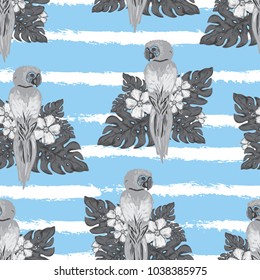 Elegant seamless pattern with parrots, hibiscus and monstera, design elements. Floral tropical pattern for invitations, cards, print, gift wrap, manufacturing, textile, fabric, wallpapers