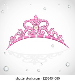 Elegant shiny pink tiara with precious stones and pearl isolated on white background