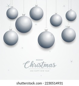 Elegant shiny white Christmas background with Silver baubles and place for text