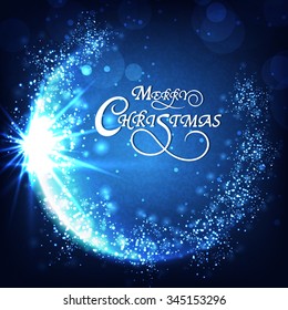 Elegant sparkling greeting card design on blue background for Merry Christmas celebration.