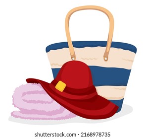 Elegant striped handbag, pink towel and red hat for a lady to use at the beach.
