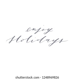 Elegant stylish Christmas hand lettered quote for greeting cards. Minimalist vector hand written holiday delicate phrase. Gentle feminine calligraphic festive brush lettering. Enjoy holidays.