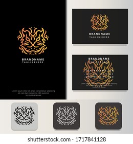 ELEGANT TIGER HEAD IN FLAME LOGO DESIGN WITH BUSINESS CARD DESIGN TEMPLATE. TRIBAL BEAST CONCEPT. MODERN MINIMALIST AND SIMPLE ELEGANT STYLE.