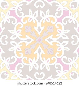 Elegant vector seamless ethnic pattern. A circular ornament with a cross in the center of the scrolls. Beautiful bright yellow juicy orange and fuchsia with bright accents and white ligature.
