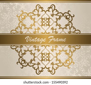 Elegant vintage frame in gold. Light background. Seamless wallpaper