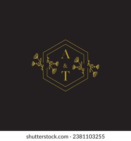 AT elegant wedding initial logo in high quality professional design that will print well across any print media