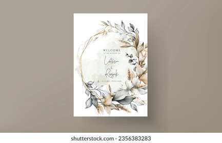 Elegant wedding invitation card with bohemian leaves watercolor