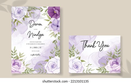 Elegant wedding invitation card with purple flower decoration