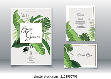 Elegant wedding invitation card with tropical leaves template Premium Vector