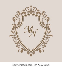 Elegant wedding monogram crest design with MN initial surrounded by intricate floral motifs