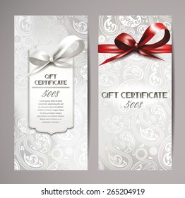 Elegant white gift certificates with silk ribbons and floral design