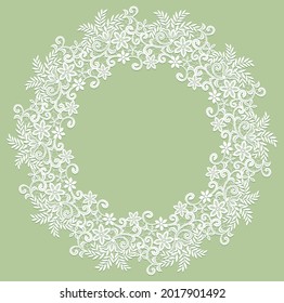 Elegant white lace frame on a green background