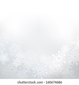 Elegant winter background made of snowflakes with blank space for your text