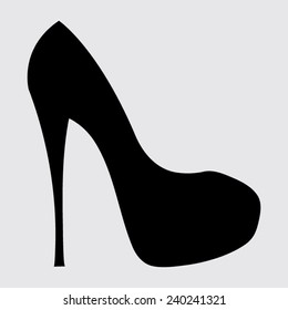 Elegant womens high heel shoe on a grey background