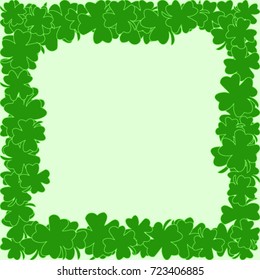 Element of design. Frame of clover leaves on a green background