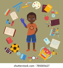Elementary or middle school schoolboy with arm prothesis is back to school and lessons. Supplies are notebooks, planner, pencil case textbook, balls for sports. Happy disabled handicapped boy