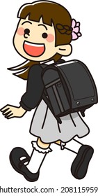 Elementary school boy carrying a black school bag on her back