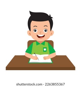 Elementary school boy student is writing in a book