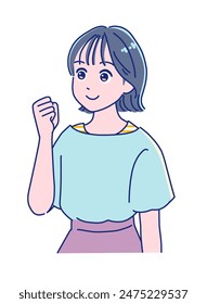 Elementary school girl smiling and fist-pumping