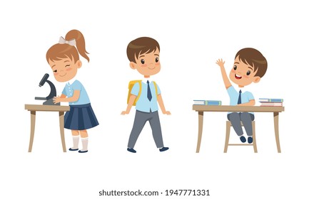 Elementary School Students Studying at School, Adorable Boys and Girl in School Uniform During Lesson, Back to School Concept Cartoon Vector Illustration