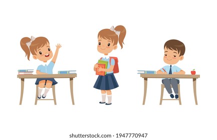 Elementary School Students Studying at School Set, Boys and Girl in School Uniform During Lesson Cartoon Vector Illustration