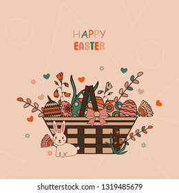 elements for easter in the basket. A traditional holiday. Eggs, rabbit. Theme of spring.