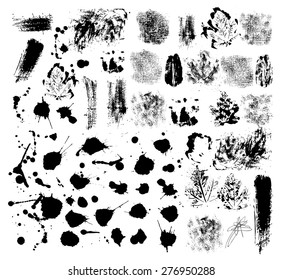 Elements for grunge design and ink blots isolated on white background, vector image.