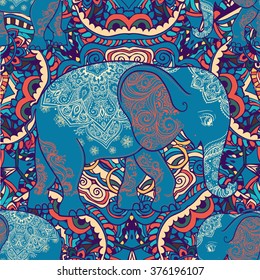 The elephant in the background of the ornament backgrounds. Bright pattern. India ethno style.