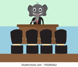 Elephant business man talking on stage.
