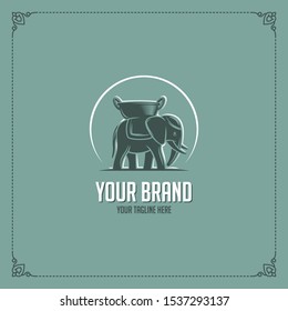Elephant carrying a pan illustration for Indian curry restaurant logo. Elephant vintage logo. Elephant and pan silhouette for Thailand restaurant. Eps10.