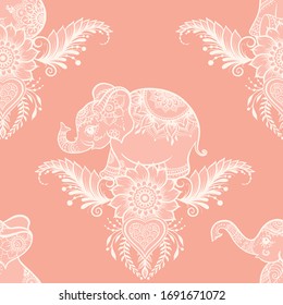 Elephant in eastern ethnic style, traditional indian henna ornament. Seamless pattern, background in soft rose colors. Vector illustration..