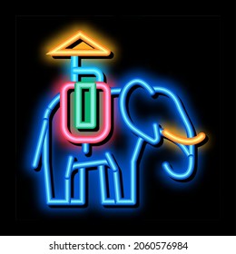 Elephant For Excursions neon light sign vector. Glowing bright icon Elephant Animal Traditional Thai Transport With Chair And Umbrella sign. transparent symbol illustration